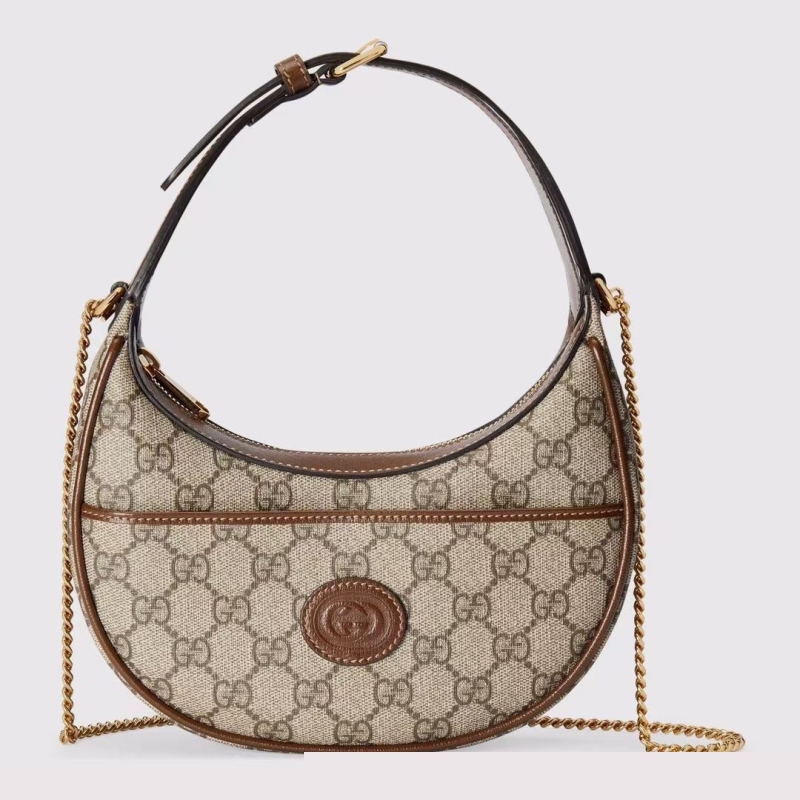 G*u*i top handle bags
